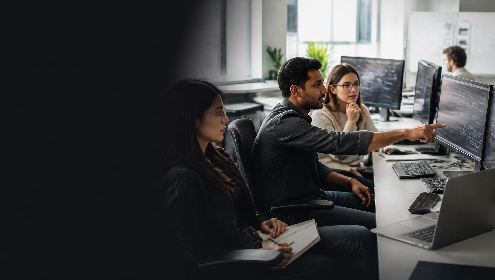 QA team collaborating in a real-world software testing environment